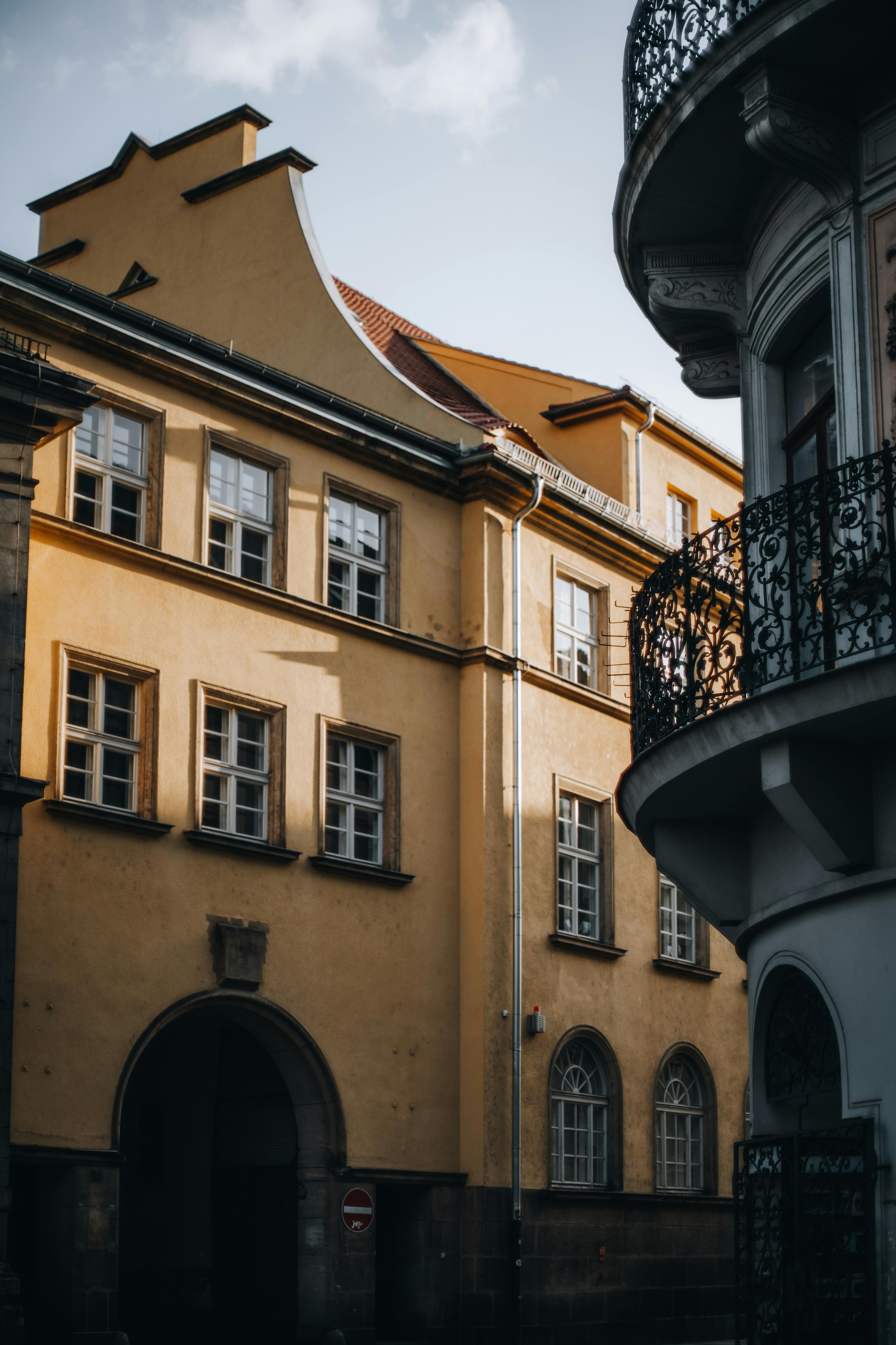 Explore the charming architecture of historic urban buildings with artistic facades.