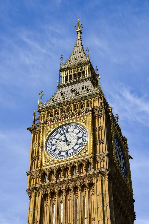 Free Close-up view of the famous Big Ben clock tower on a clear day in London, England. Stock Photo