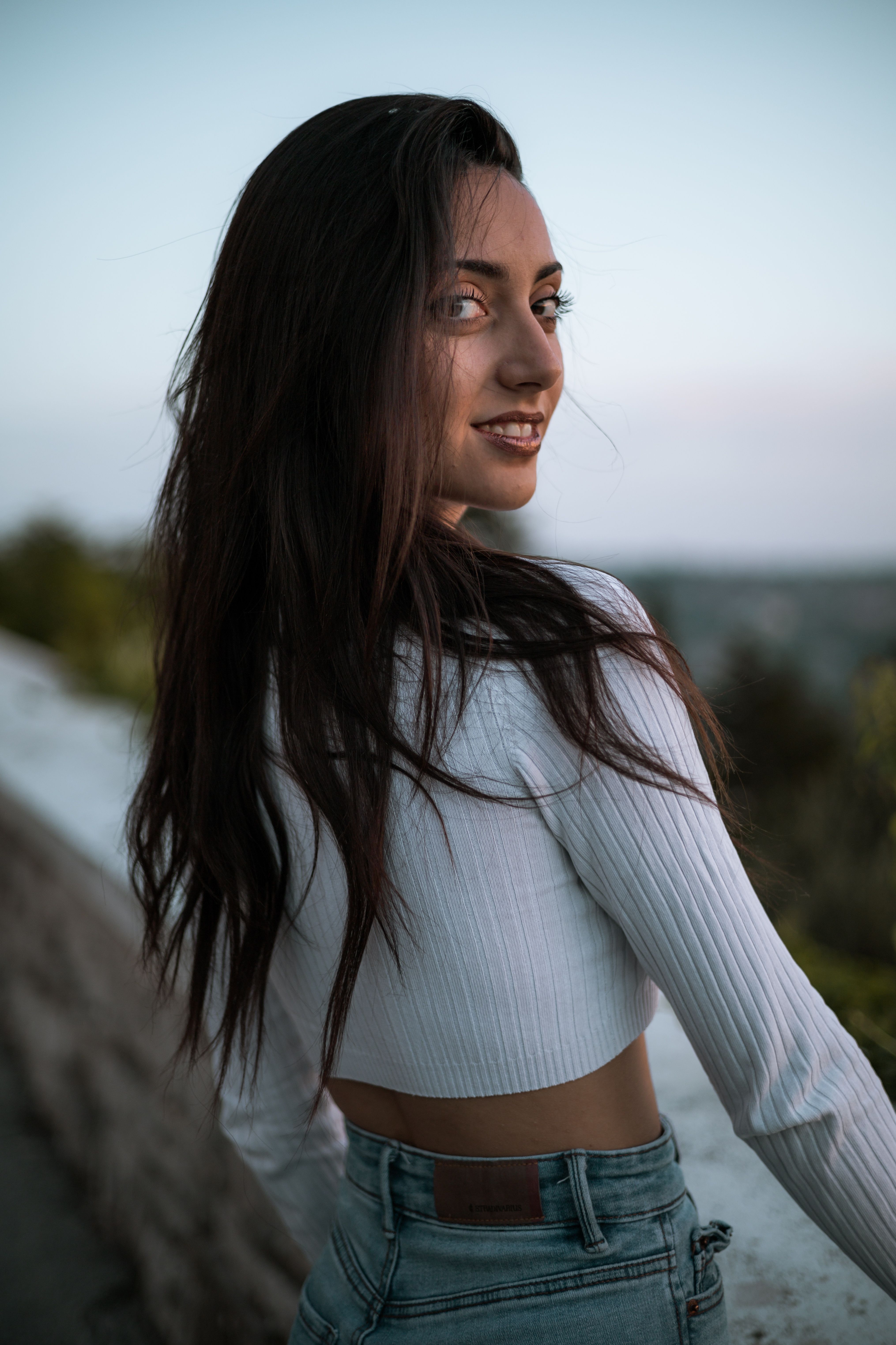 Smiling Woman Looking Back · Free Stock Photo