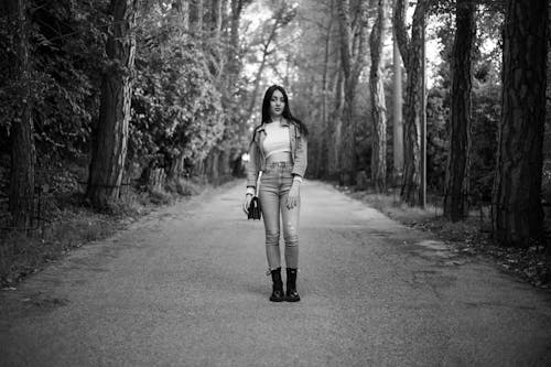 Brunette Model on Road in Forest in Black and White