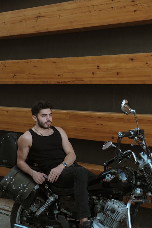 Model in Black Tank Top on Motorcycle