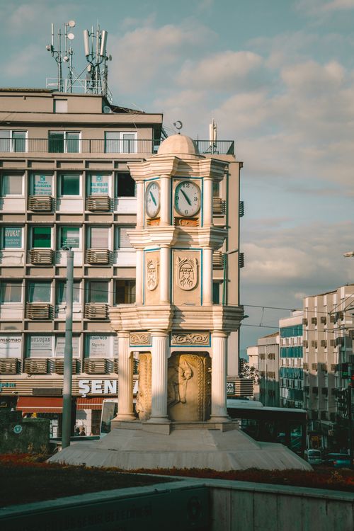 Free Elegant clock tower in a Turkish cityscape captures urban details and architecture. Stock Photo