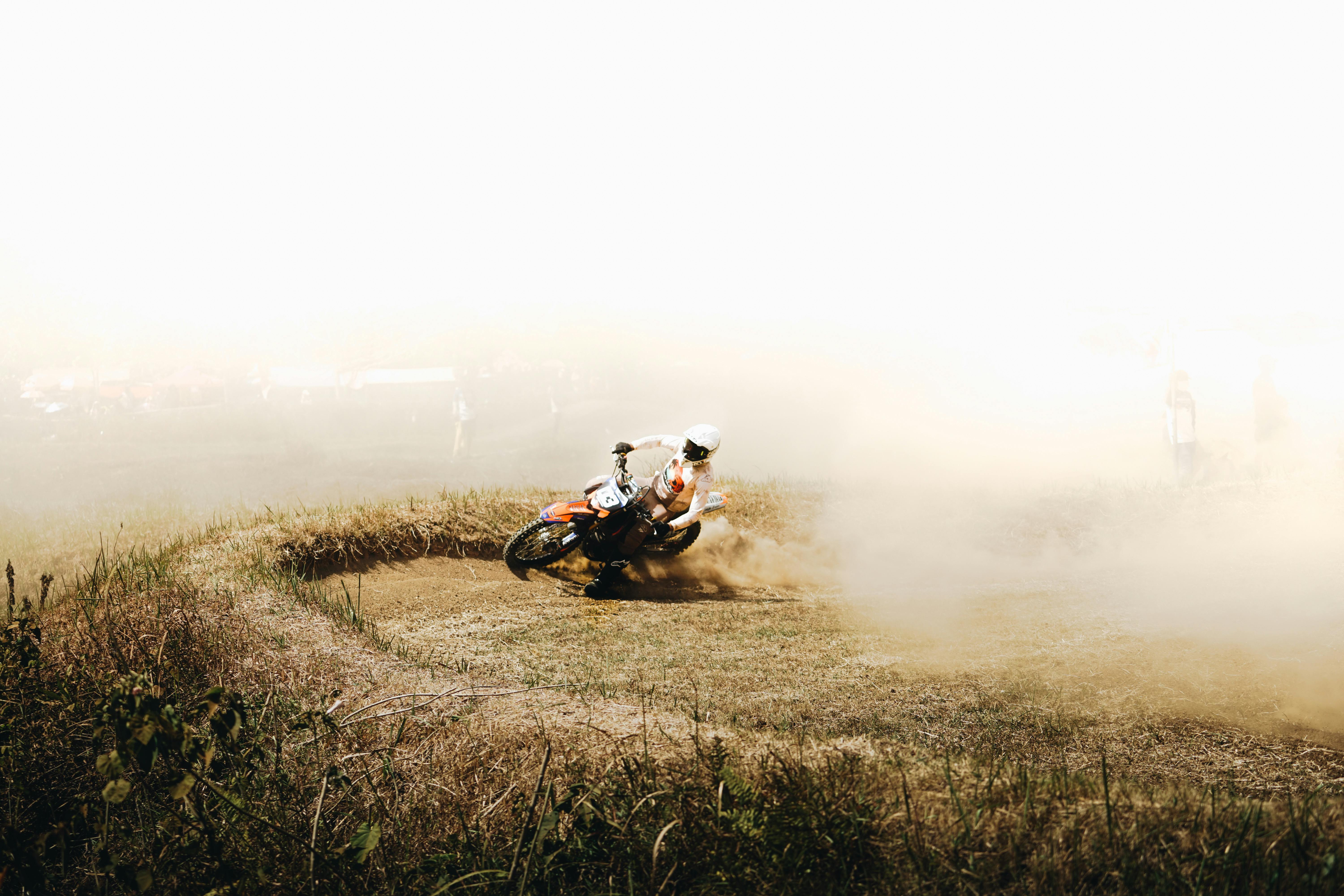 Exciting motocross action on a dusty track in West Java, Indonesia.