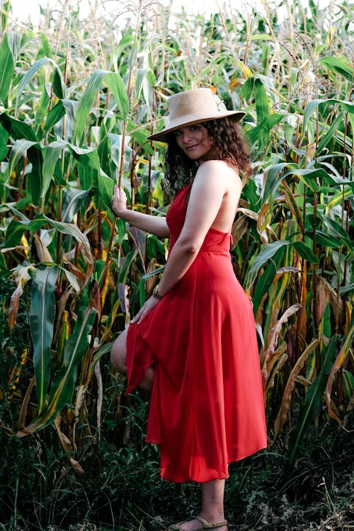 Woman in Red Dress on Field