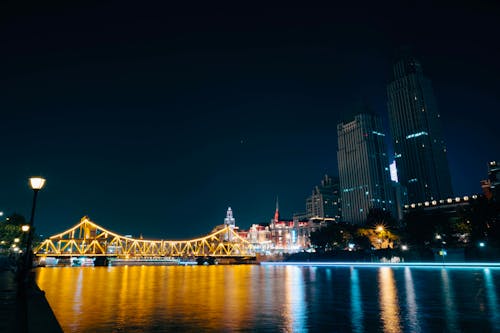 View of Illuminated at Night Jiefang Bridge Wharf in Tianjin, China 