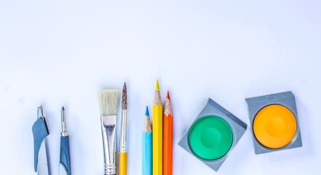 A vibrant collection of art supplies including brushes, pencils, and paints on a white background.