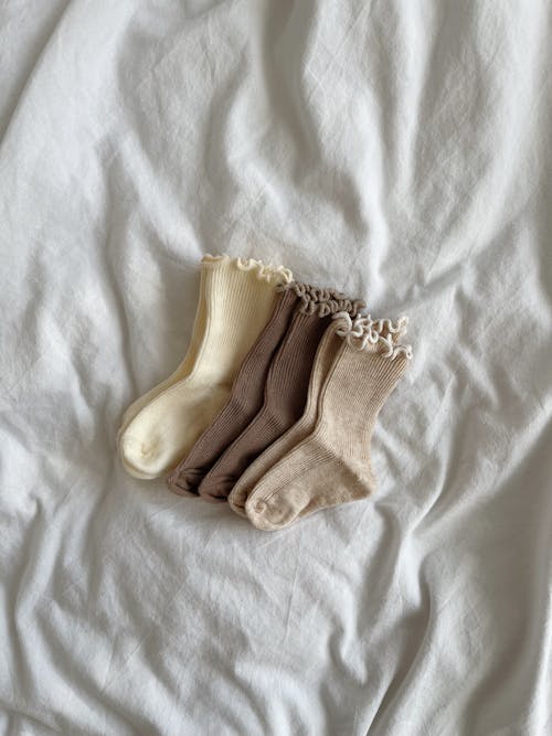 Children Socks on a Bed