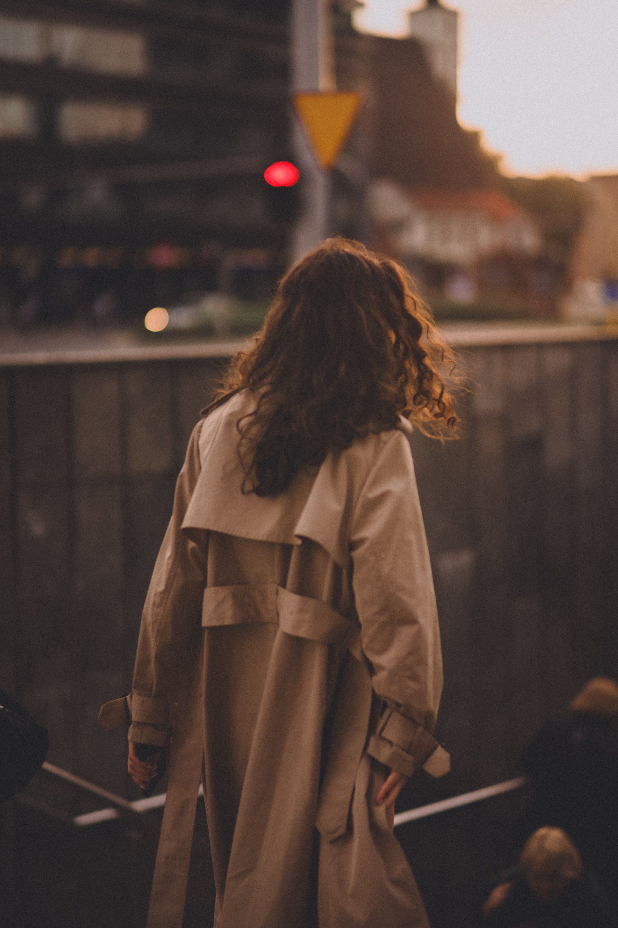 Woman Holding on Railings · Free Stock Photo