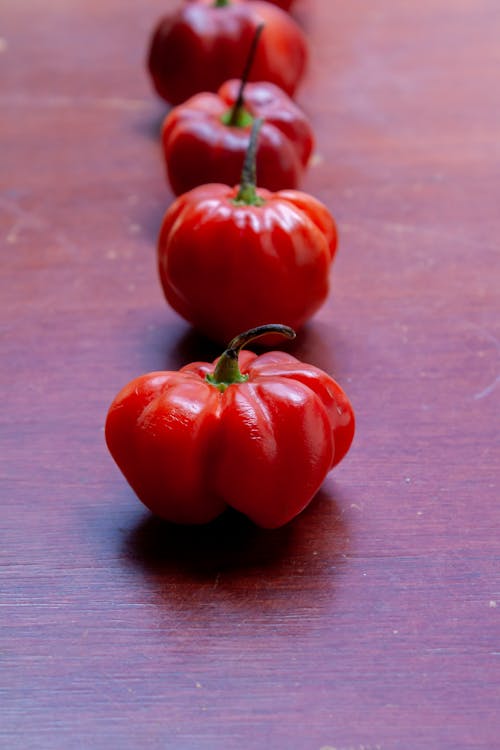 Close-up of Red Bell Peppers Lying on a Table