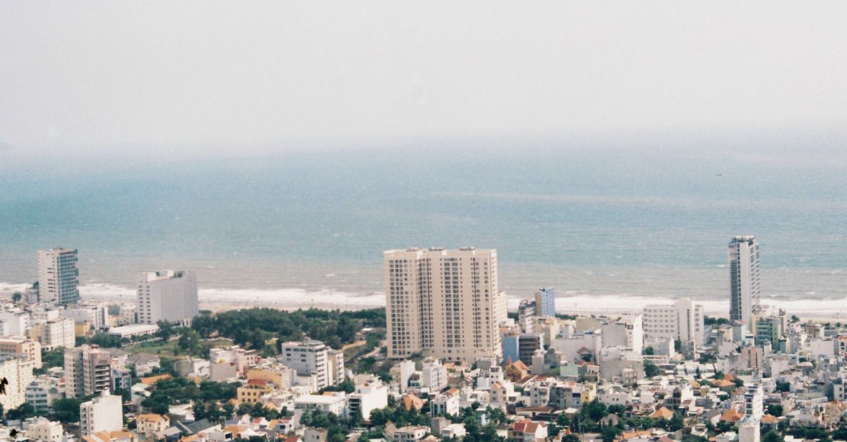 Breathtaking aerial view of Vung Tau coastline and cityscape, Vietnam.