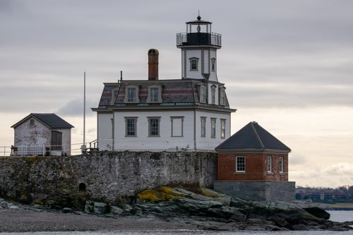 Free Scenic view of Rose Island Lighthouse on a cloudy day in Newport, RI. Stock Photo