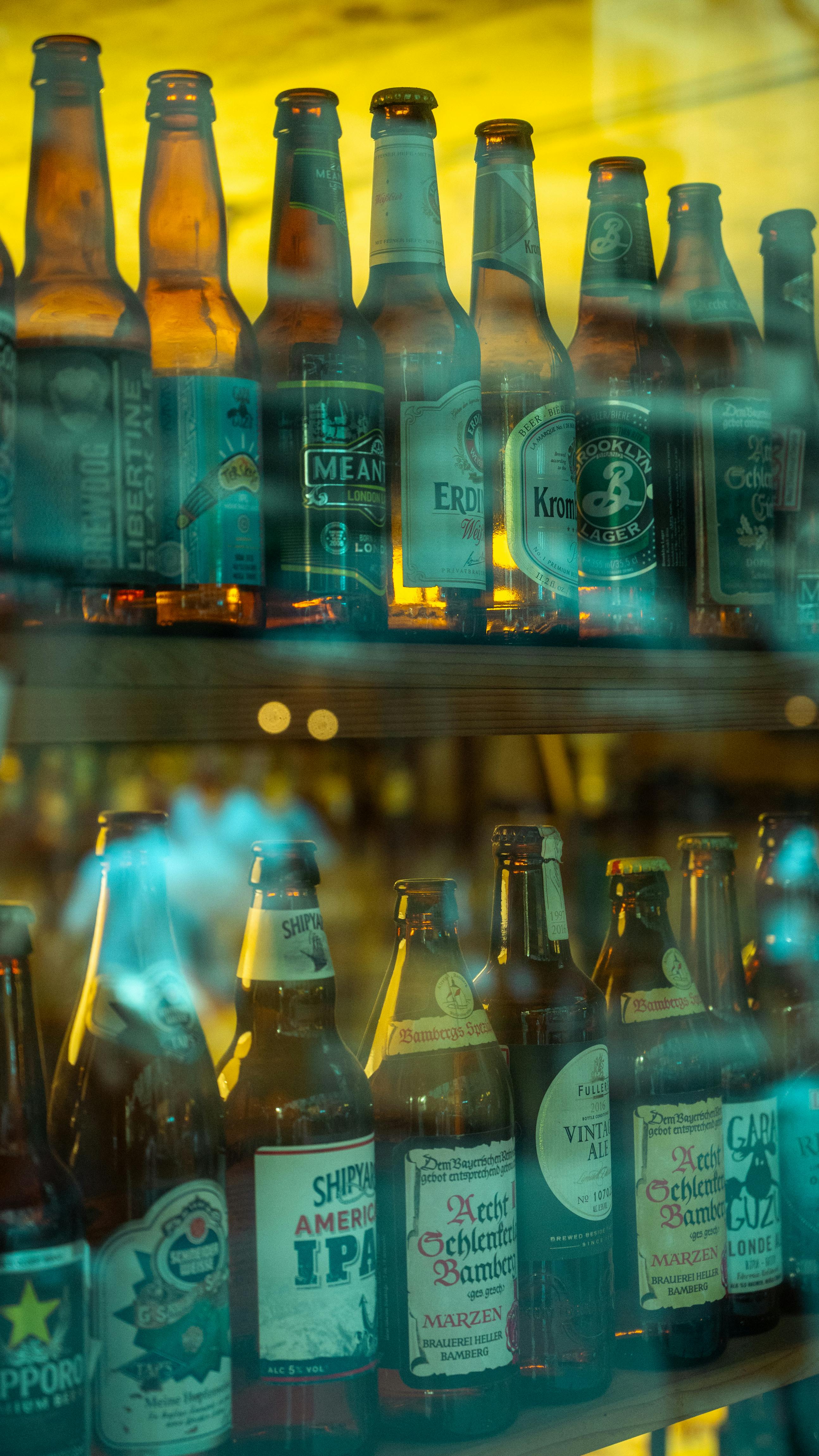 bottles-of-alcohol-on-window-display-free-stock-photo