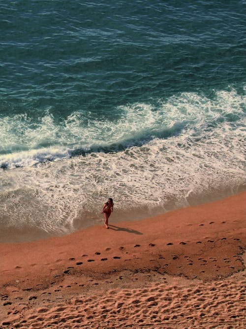 Woman on a Sunny Beach 