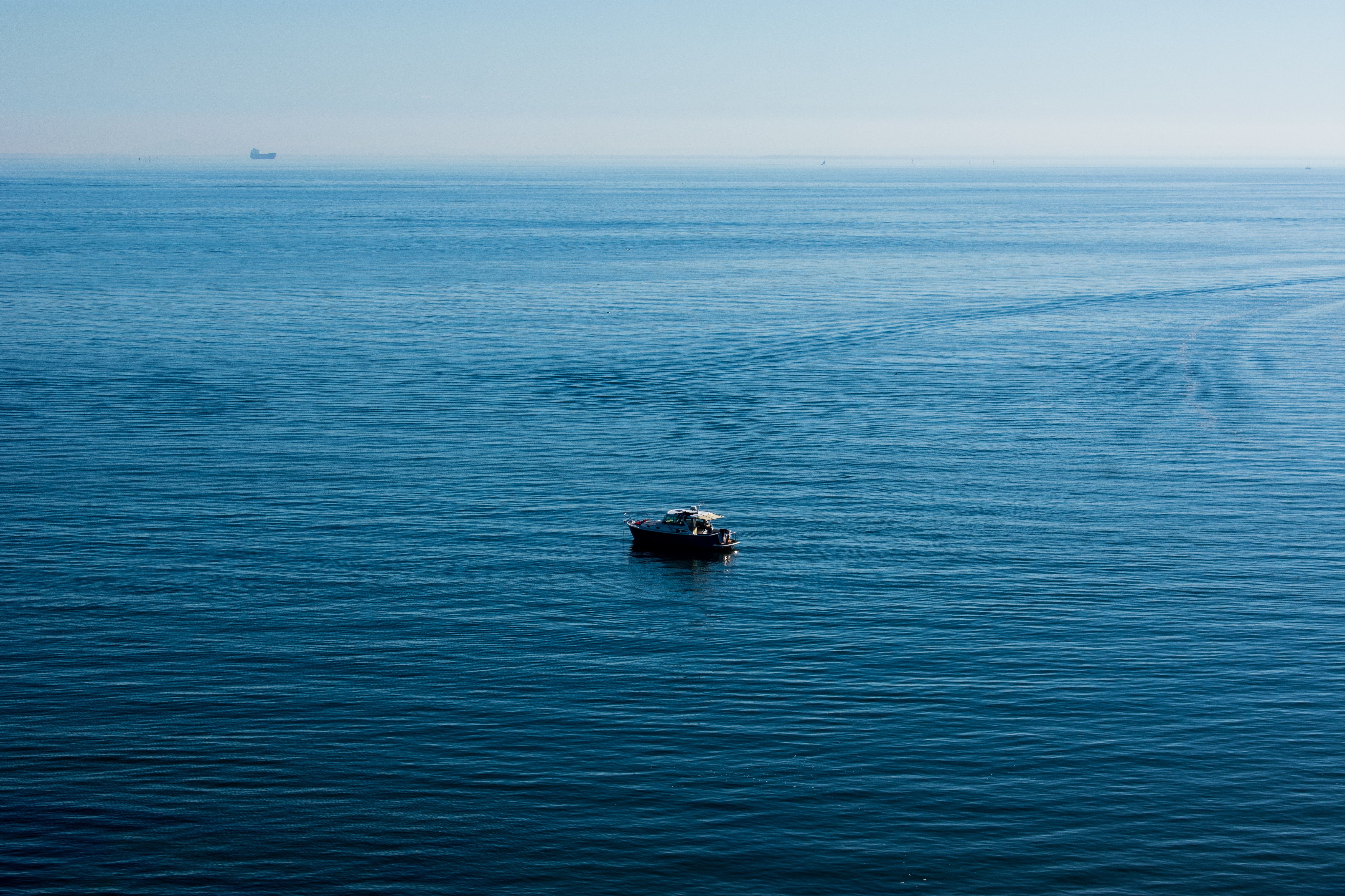 Boat on open sea aerial