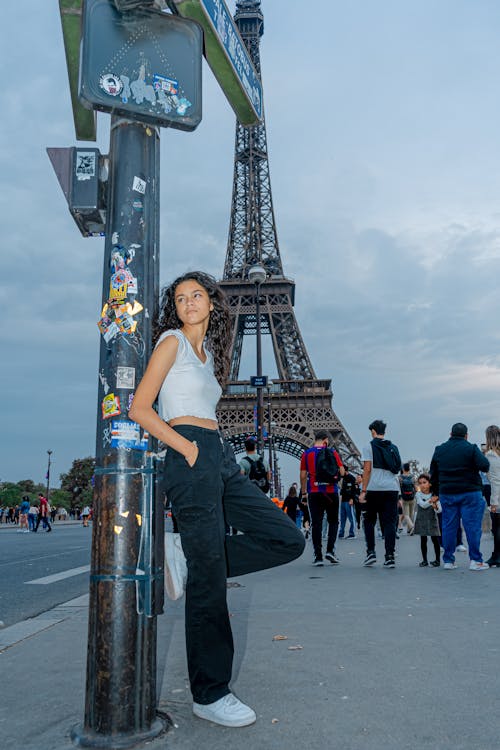 Woman Posing in Front of Eiffel Tower 