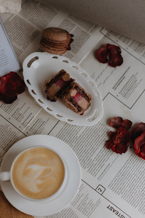 Free Cakes and a Cup of Coffee on the Table  Stock Photo