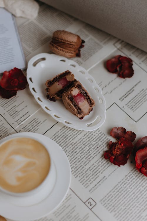 Free Cakes and a Cup of Coffee on the Table  Stock Photo