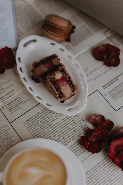 Free Cakes and a Cup of Coffee on the Table  Stock Photo