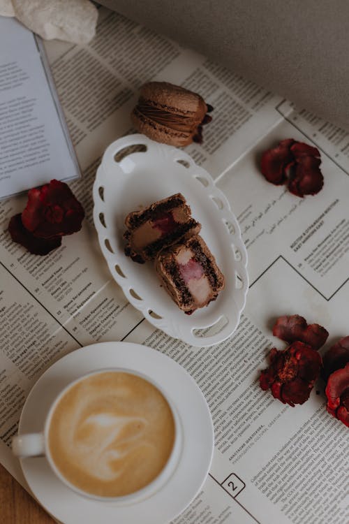 Free Cakes and a Cup of Coffee on the Table  Stock Photo