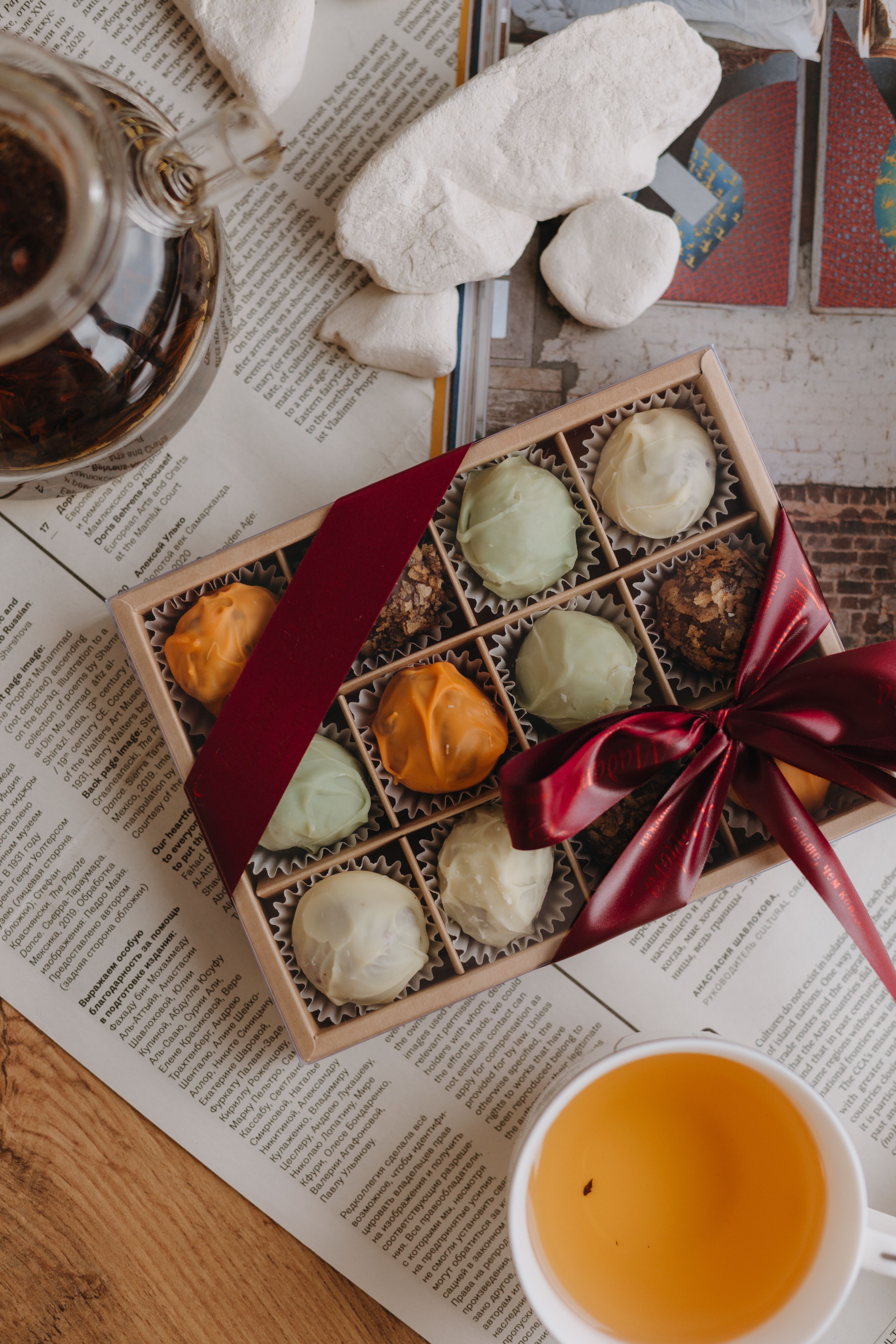 Box of Pralines and Tea on the Table · Free Stock Photo