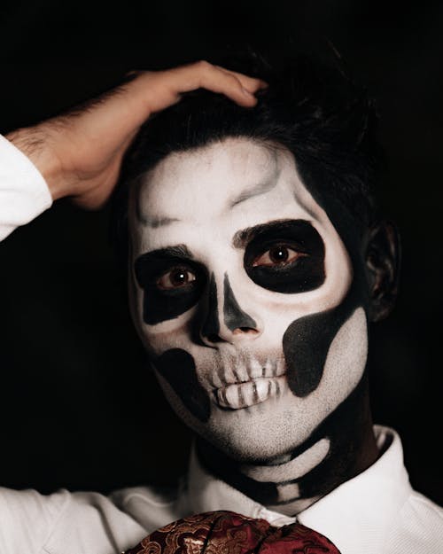 Man in a Skull Makeup and Costume for the Day of the Dead Celebrations in Mexico