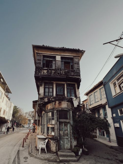 Free Old abandoned wooden house on a street in Mudanya, Turkey, showcasing urban decay. Stock Photo