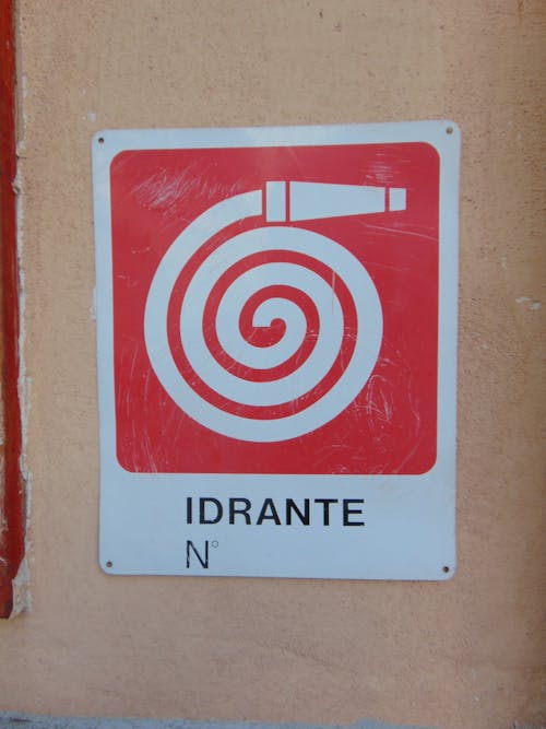 Free Fire hose sign in Italy Stock Photo