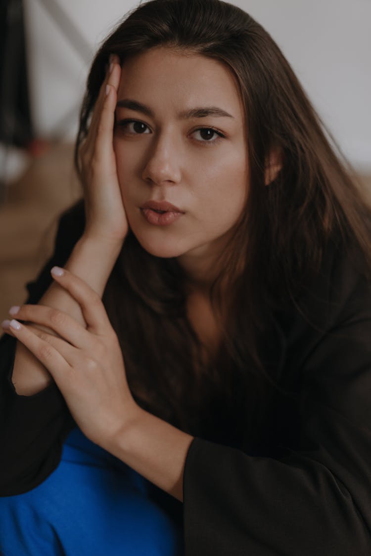 Portrait Of A Pretty Brunette Looking Straight At The Camera