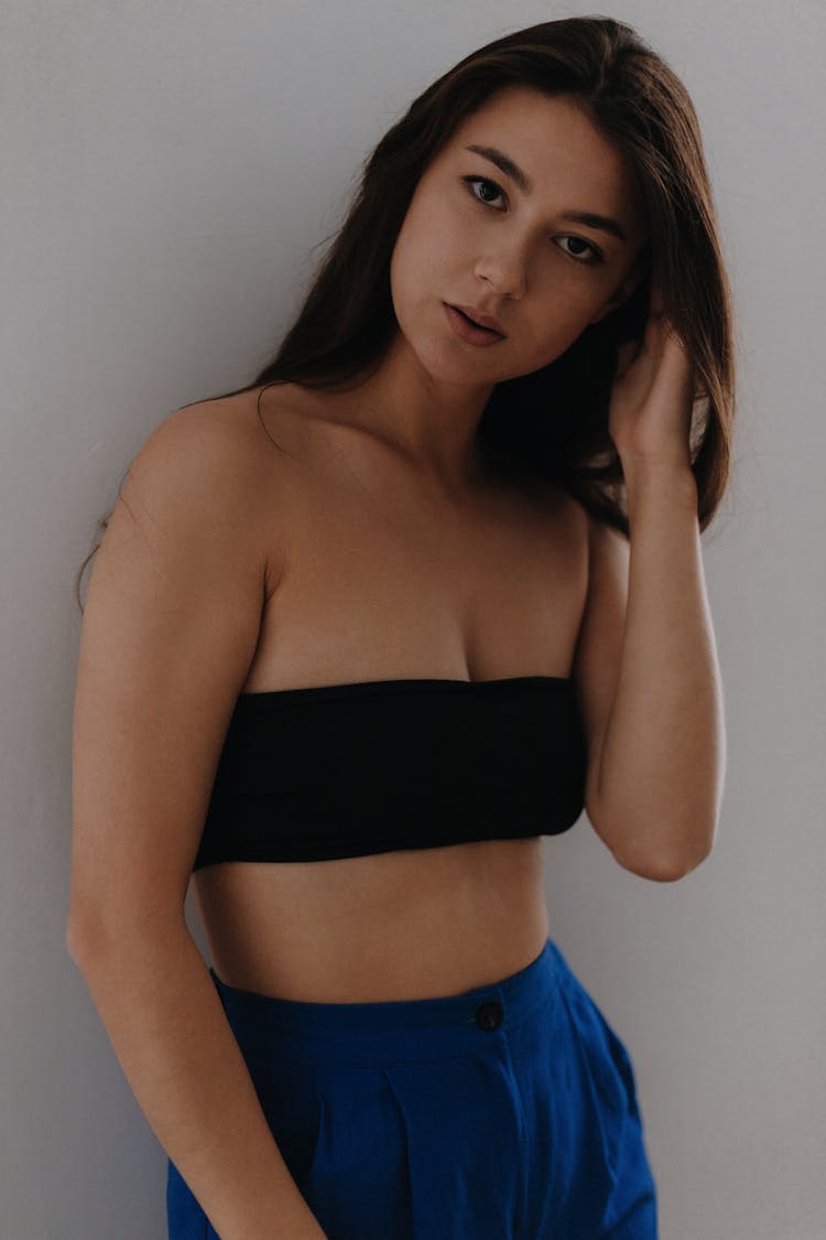 Portrait Of A Pretty Brunette Wearing A Black Sports Bra