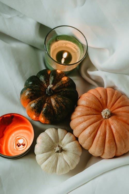 Top View of Pumpkins and Candles 