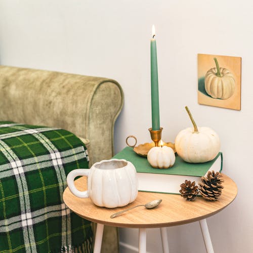 Coffee Table with White Pumpkin Decoration