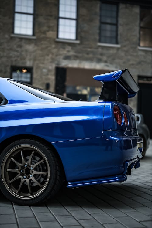 Blue Sport Car on a Street