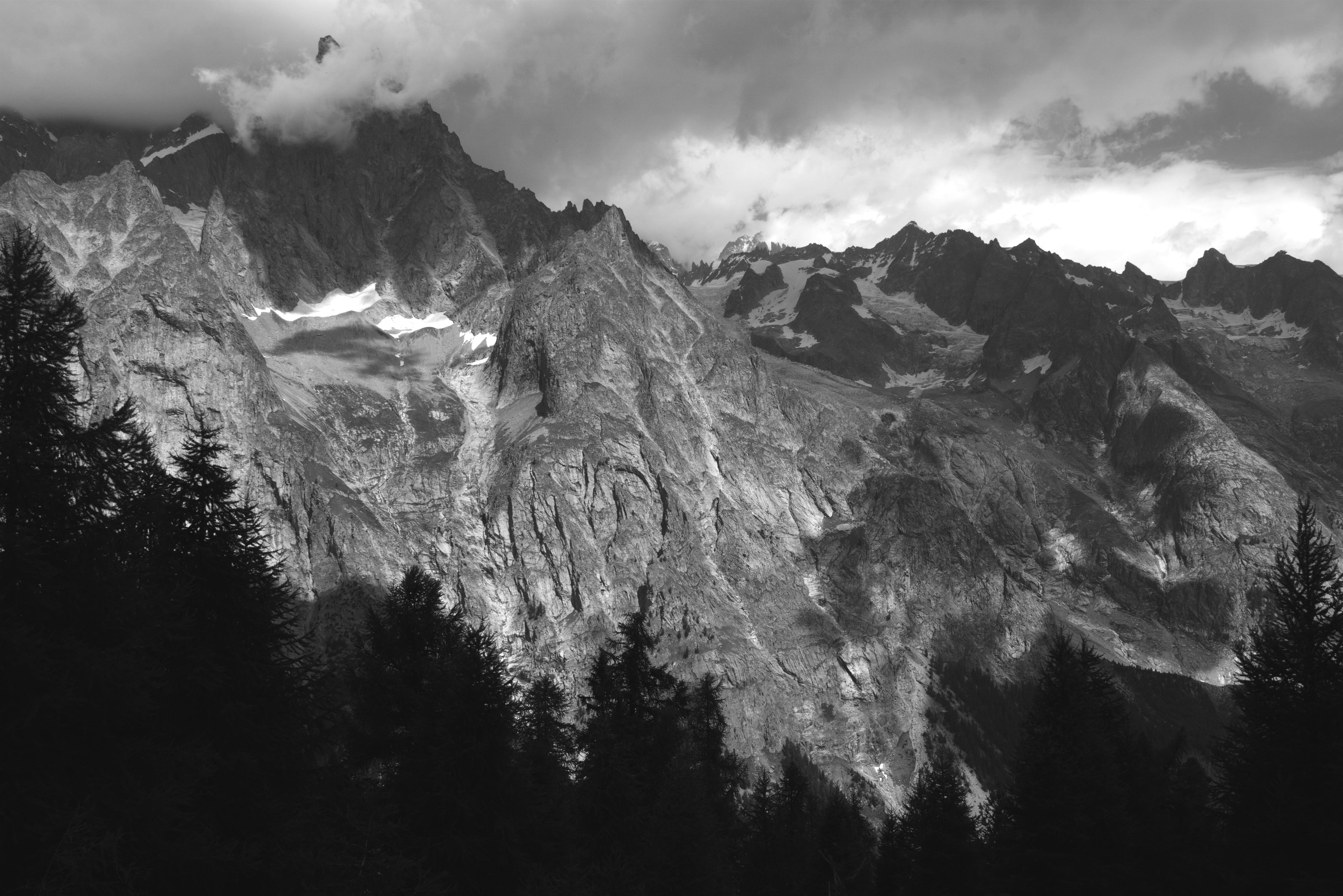 Black and white view of the rugged mountains in Courmayeur, Italy.