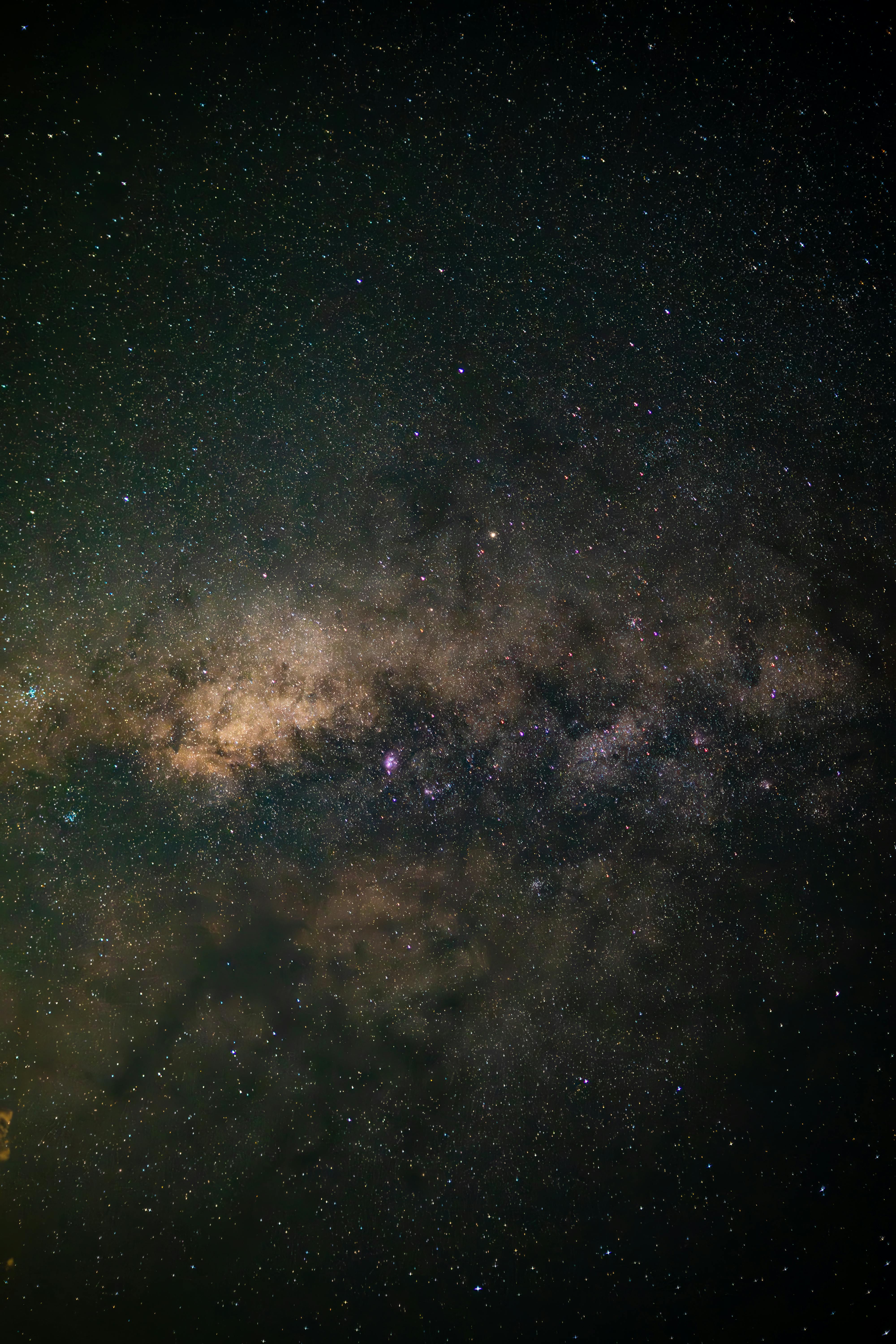 A breathtaking view of the Milky Way galaxy under a clear night sky, showcasing the beauty of space.