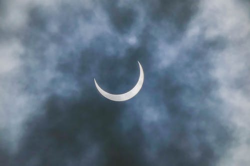 Crescent and Clouds on Sky