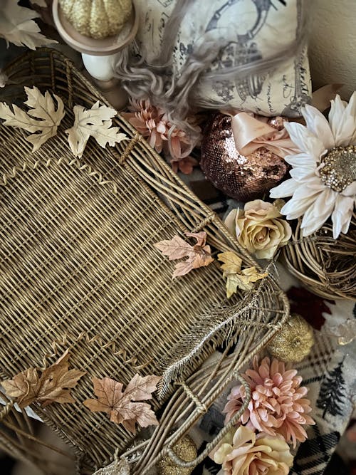 Wicker Basket with Autumn Leaves and Flowers