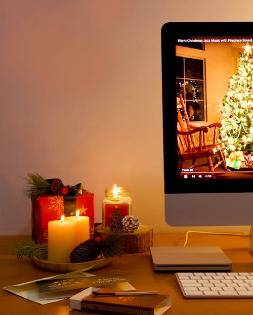 Flaming Candles Beside the Computer