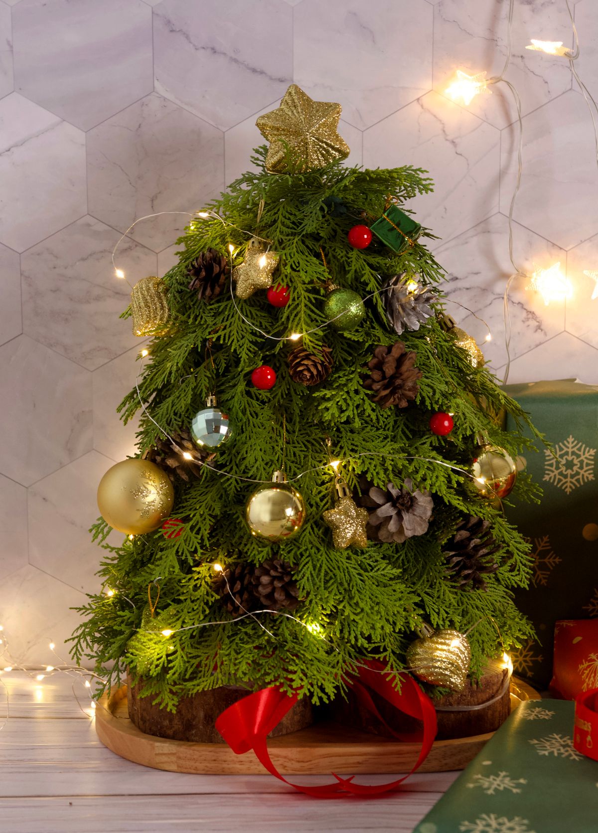 Christmas light decor ideas with small Christmas trees with lights and baubles