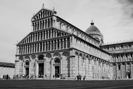 Stunning monochrome photo of Pisa Cathedral showcasing Romanesque architecture.