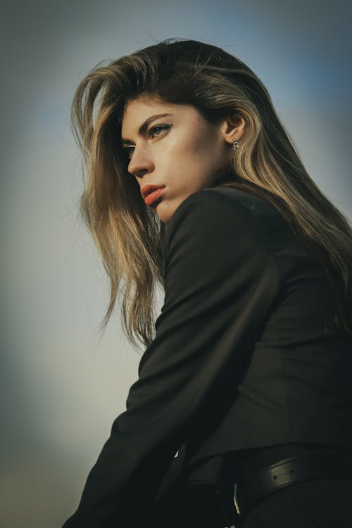 Young Woman Posing in Black Crop Jacket