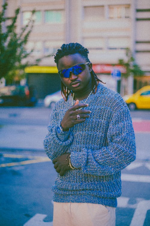 Man in Knitted Blue Sweater on the Street