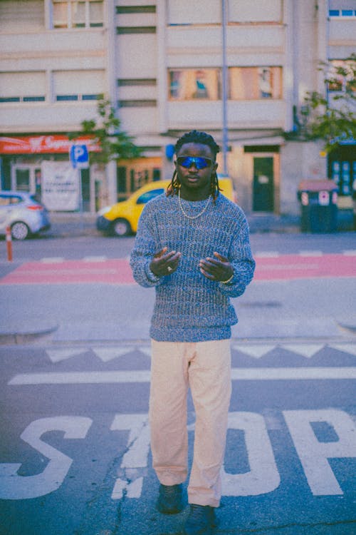 Model in Sweater and Sunglasses