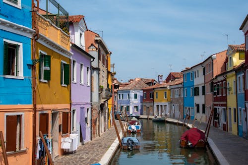 Colorful Houses on the Sides of the Canal in Murano, Venice, Italy 