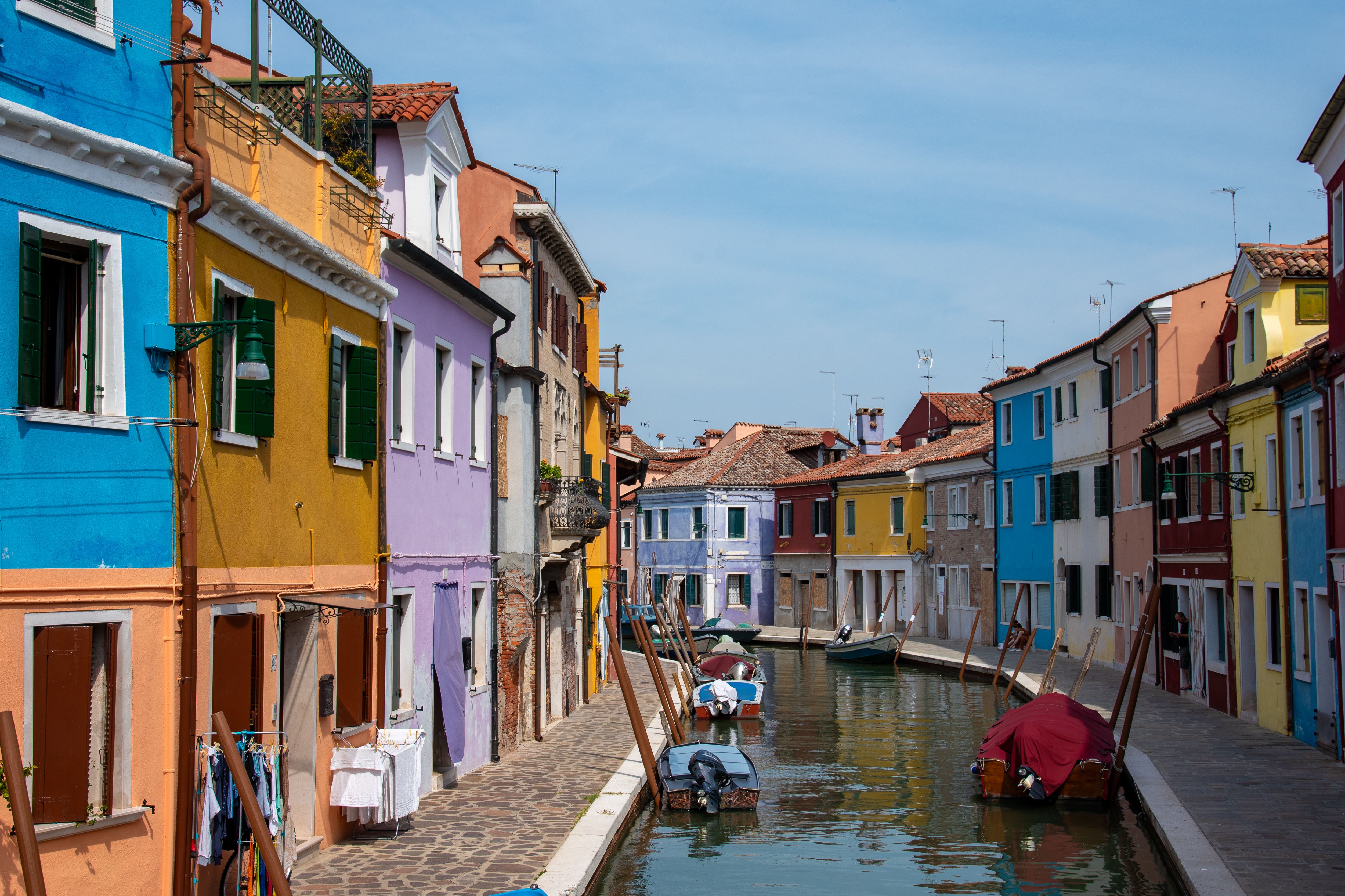 Colorful Houses on the Sides of the Canal in Murano, Venice, Italy ...
