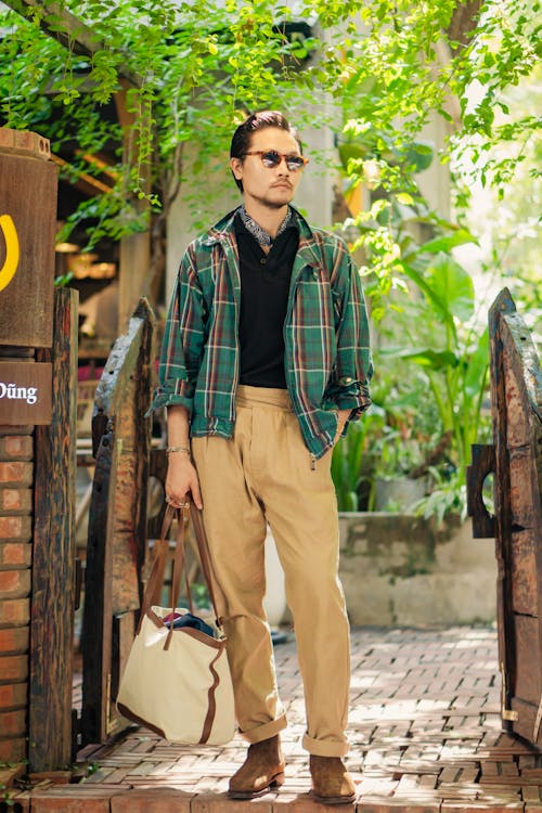 Man Wearing Sunglasses in a Garden