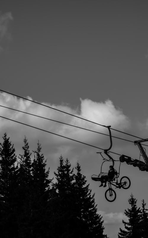 Person with Bike on Ski Lift