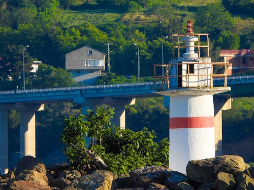 Lighthouse with a Bridge in the Background