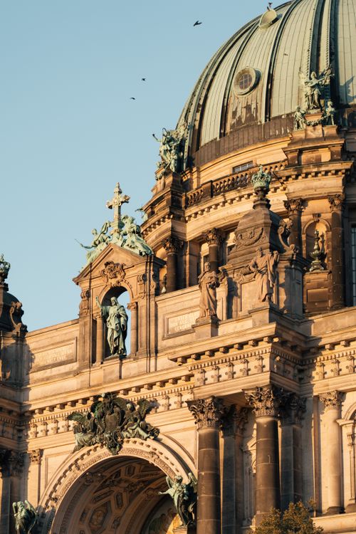 Free Close-up of Berlin Cathedral's ornate facade at sunset, showcasing intricate sculptures. Stock Photo
