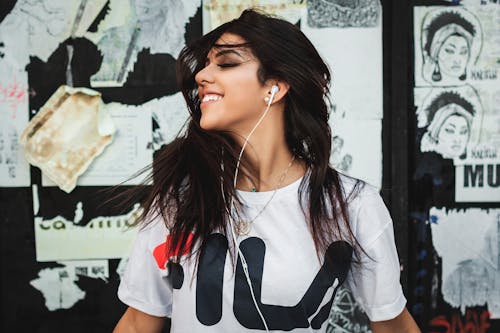 Free Woman Wearing White Shirt Near White Printer Paper Stock Photo