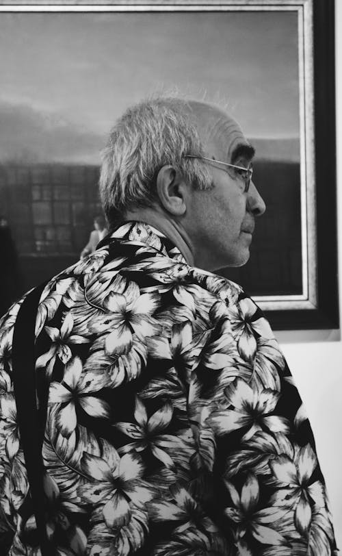 Elderly Man in Shirt with Flowers
